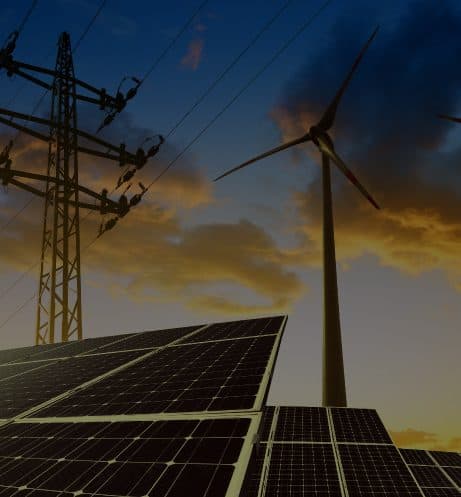 Wind turbine and solar panels beside power lines