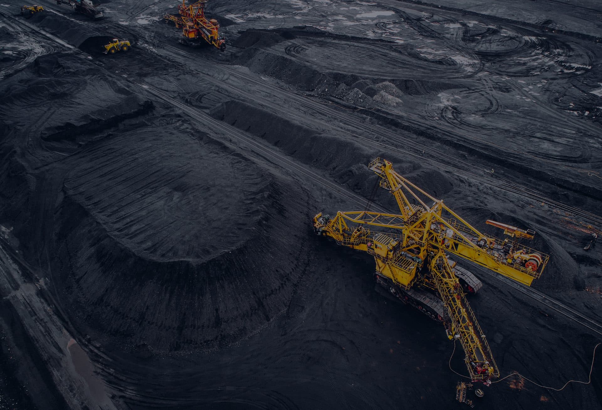 Aerial view of a coal mine with a stacker-reclaimer